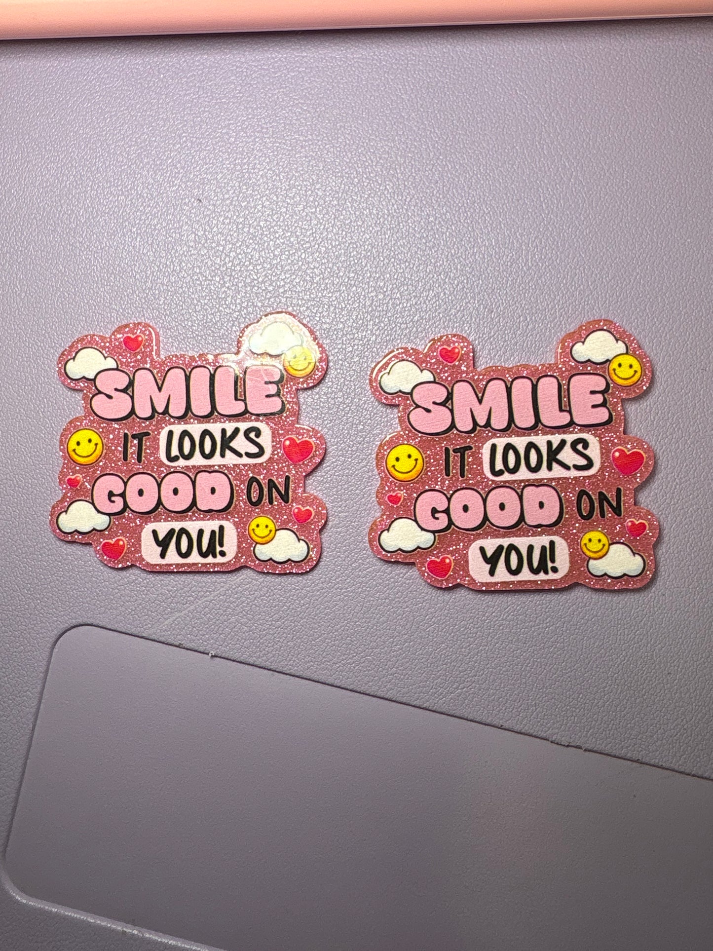 Smile it looks good on you Badge Reel
