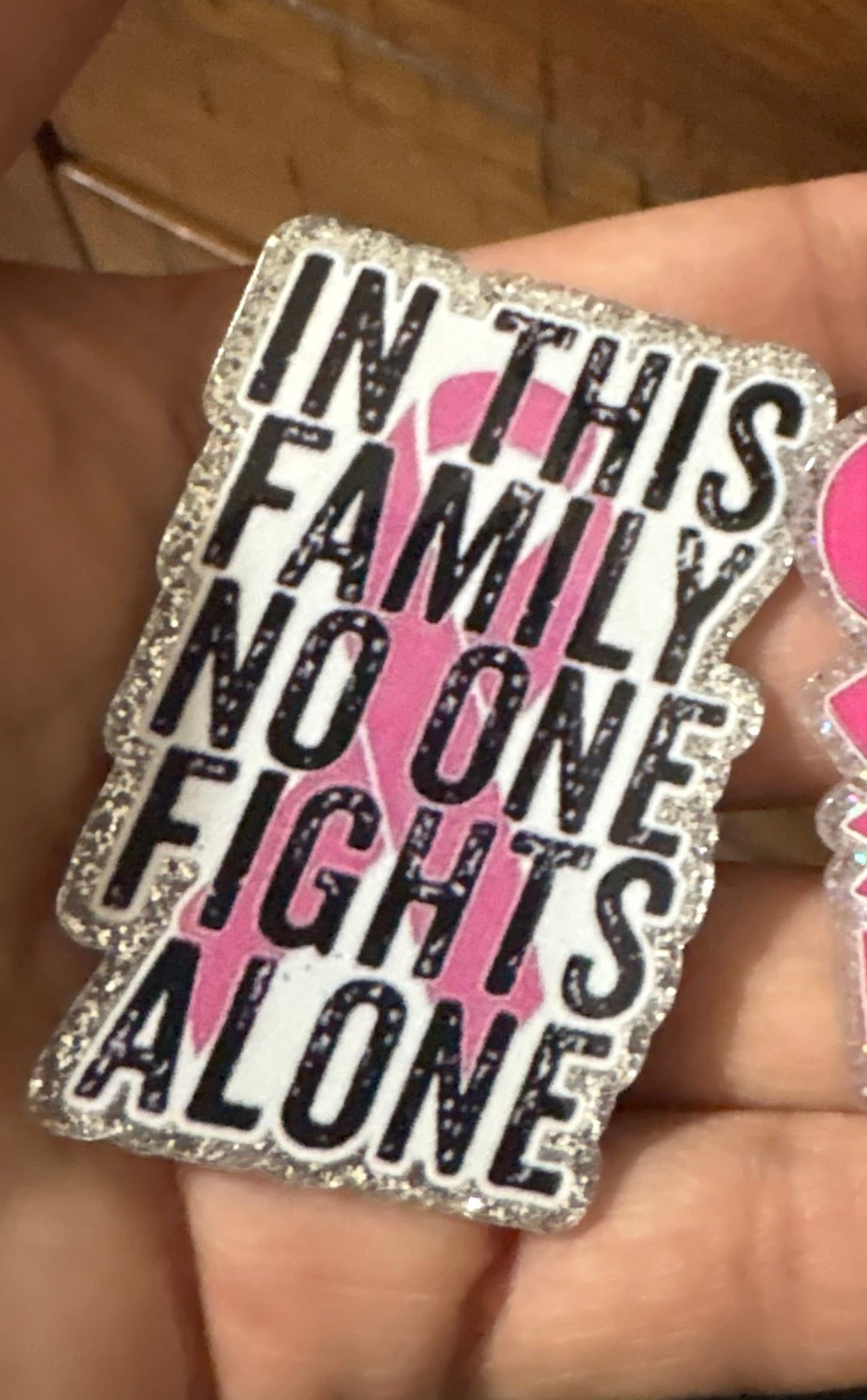 No One Fights alone breast cancer badge reel