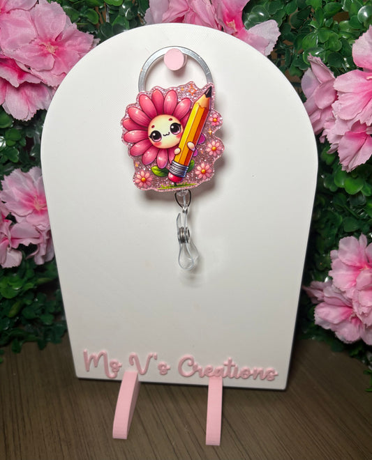 Pink Flower holding Pencil Badge Reel