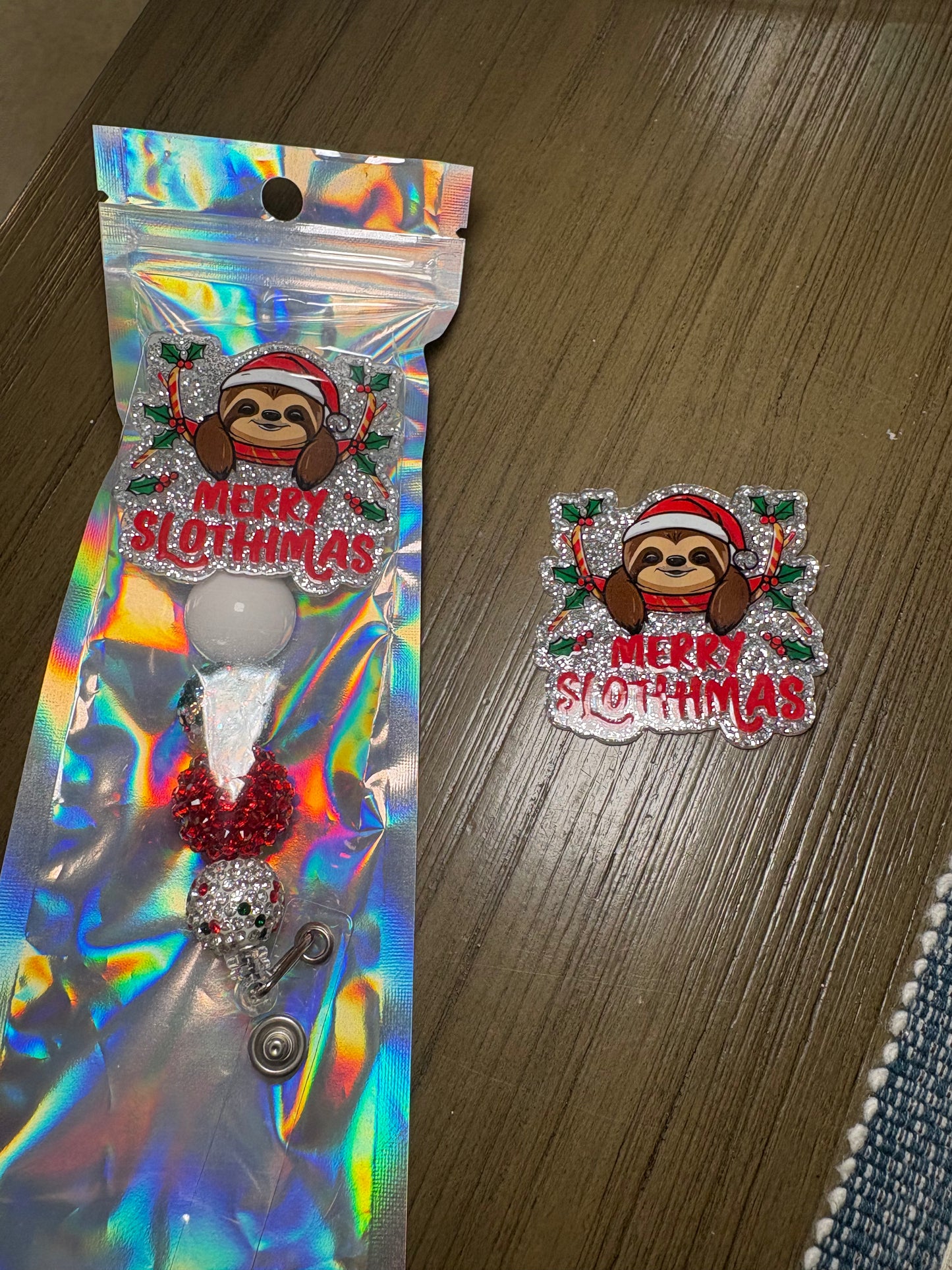 Merry Slothmas badge reel